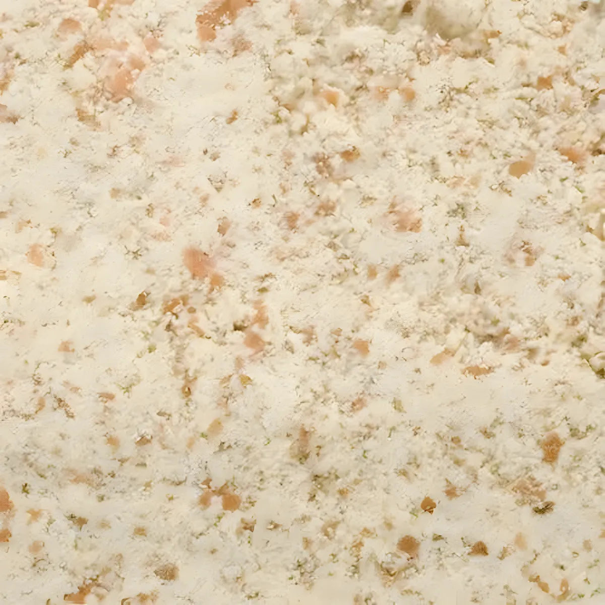 Gros plan sur la texture de l'arachide râpée PROFUIT, ingrédient sec et savoureux pour recettes sucrées ou salées, riche en goût naturel.